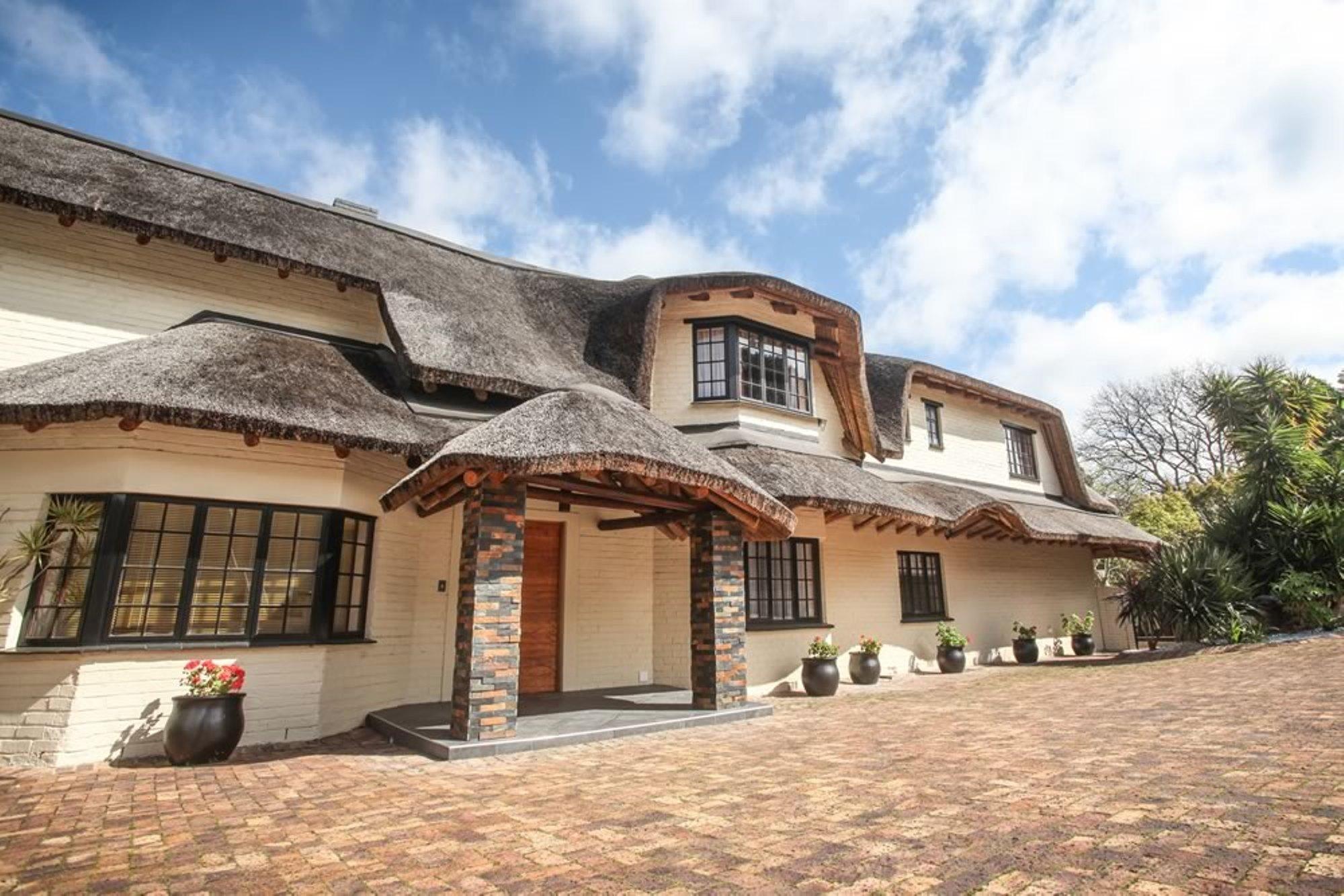 Winelands Villa Pensión y Cottages Somerset West Exterior foto